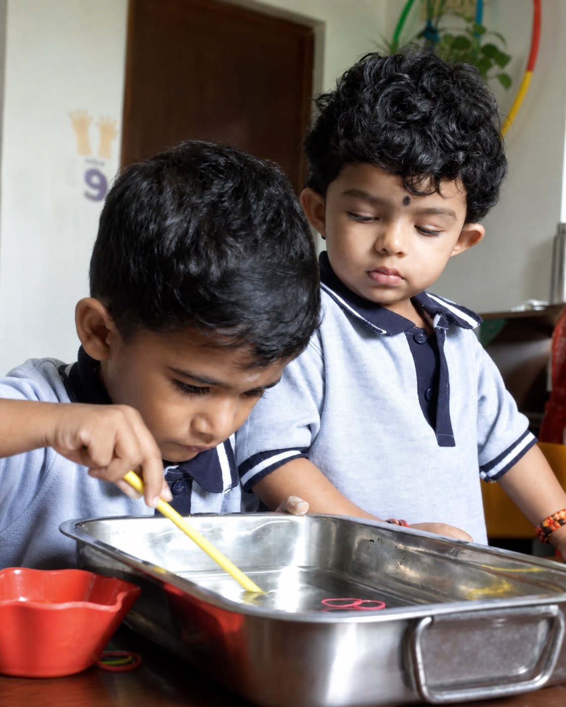 Children absorbed in a shared practical activity